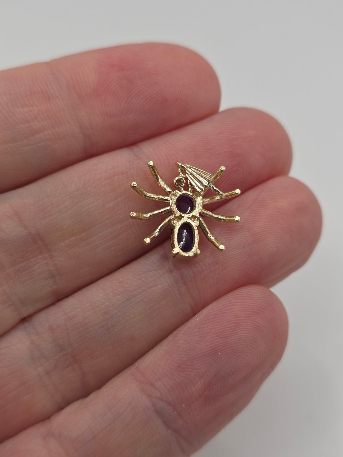 9ct gold cabachon amethyst and diamond spider pendant