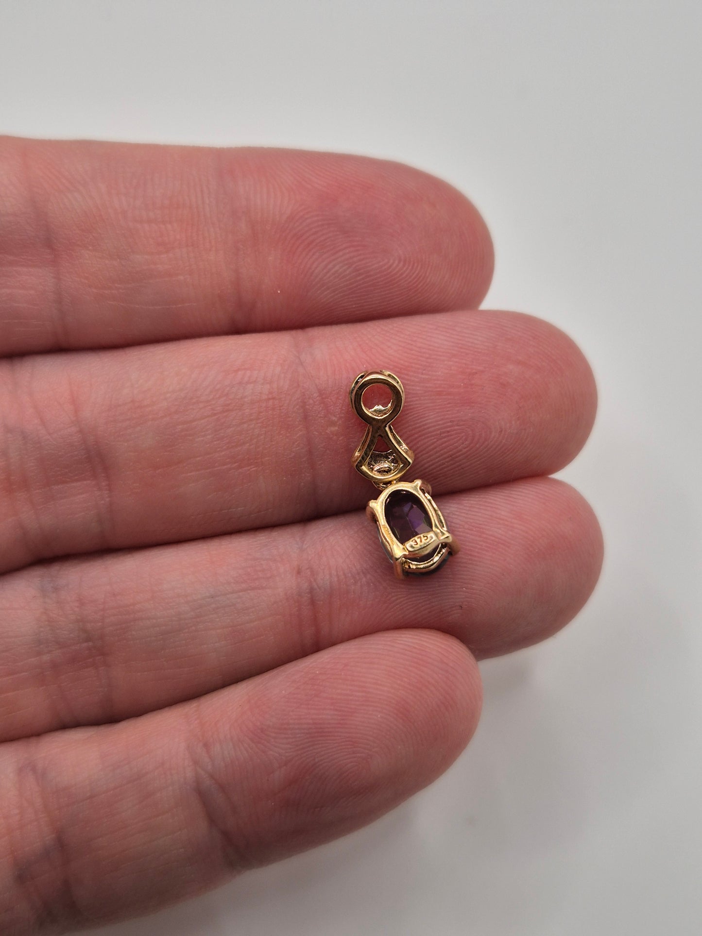 9ct gold mystic topaz and diamond pendant