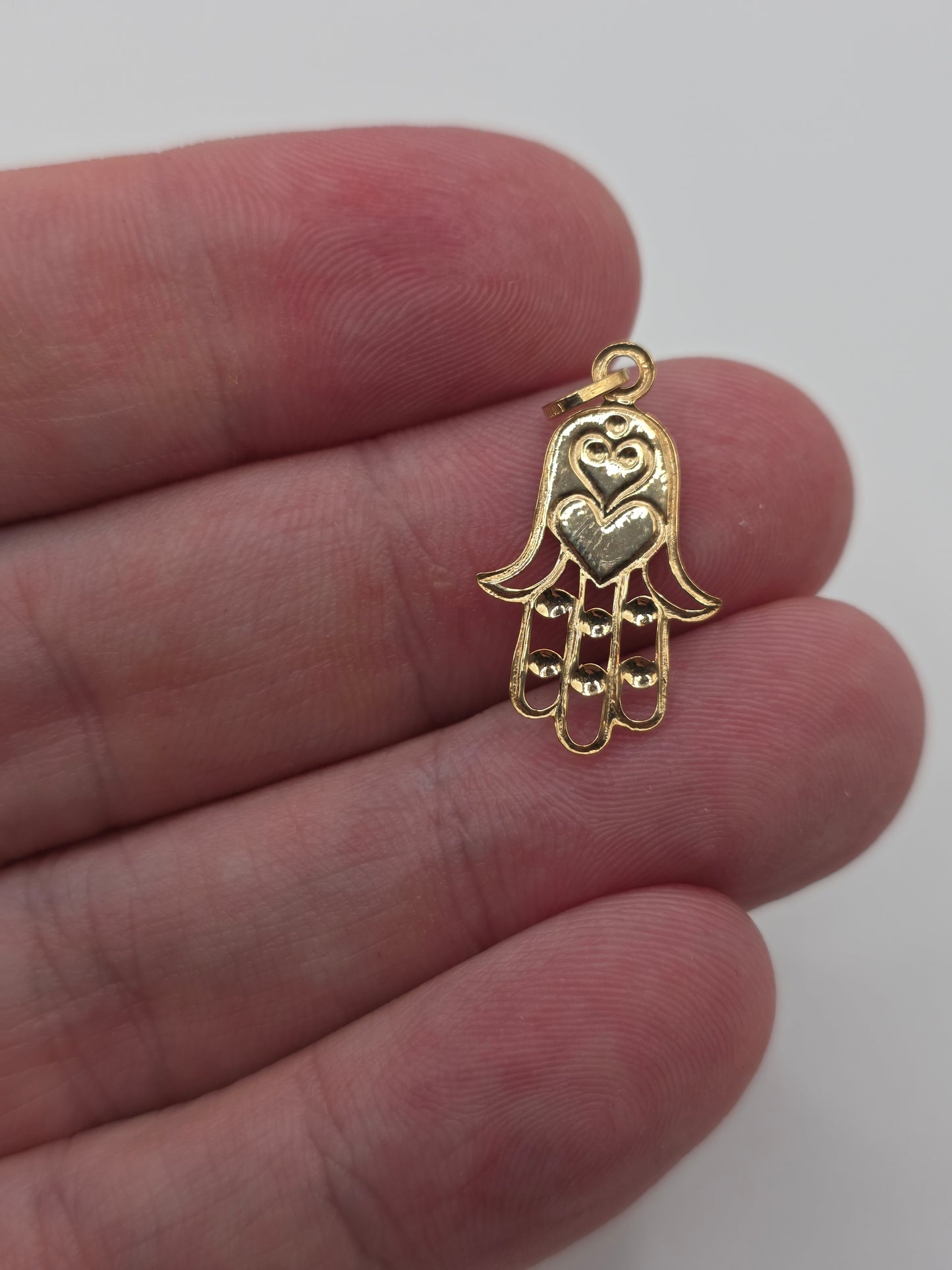 9ct gold hamsa and evil eye charm