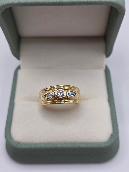 Heavy 14ct gold topaz and cz ring