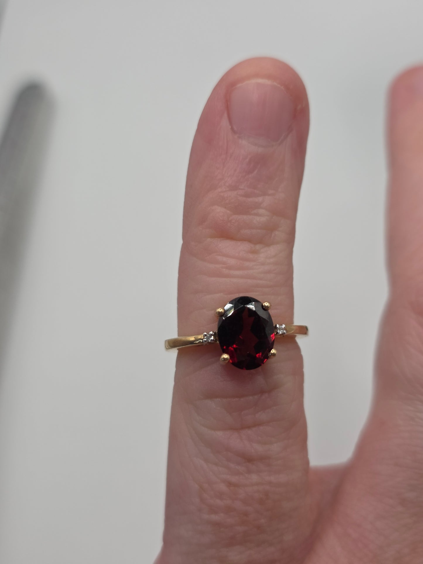 9ct gold garnet and white zircon ring