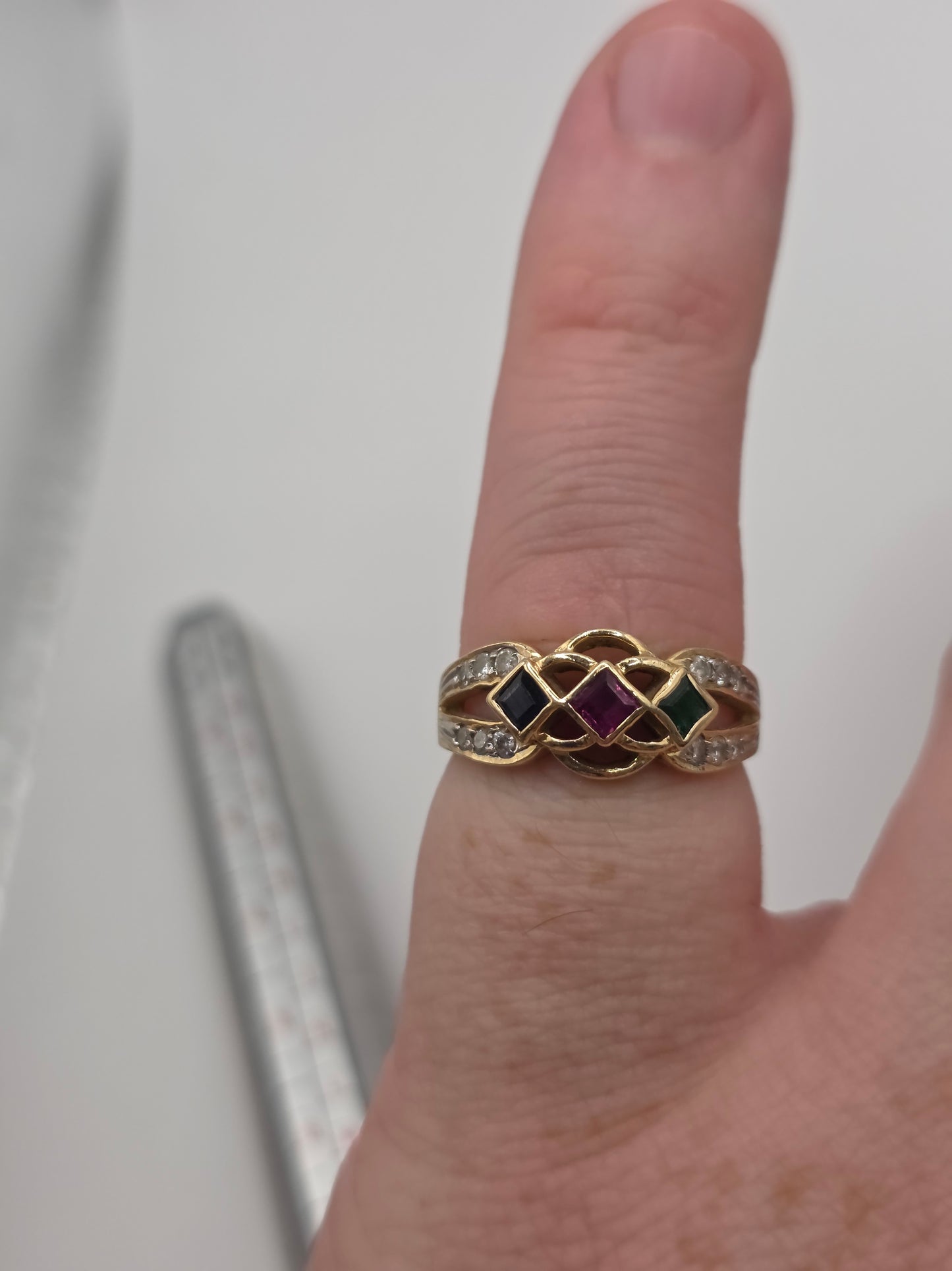 Heavy 14ct gold emerald, sapphire, ruby and diamond ring