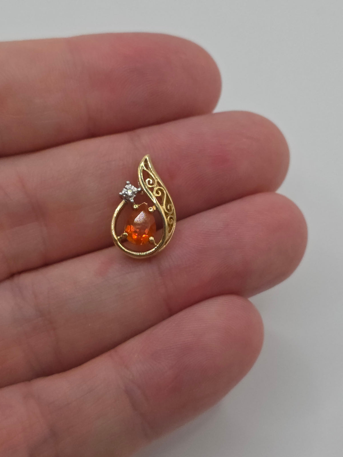 9ct gold fire opal and diamond pendant