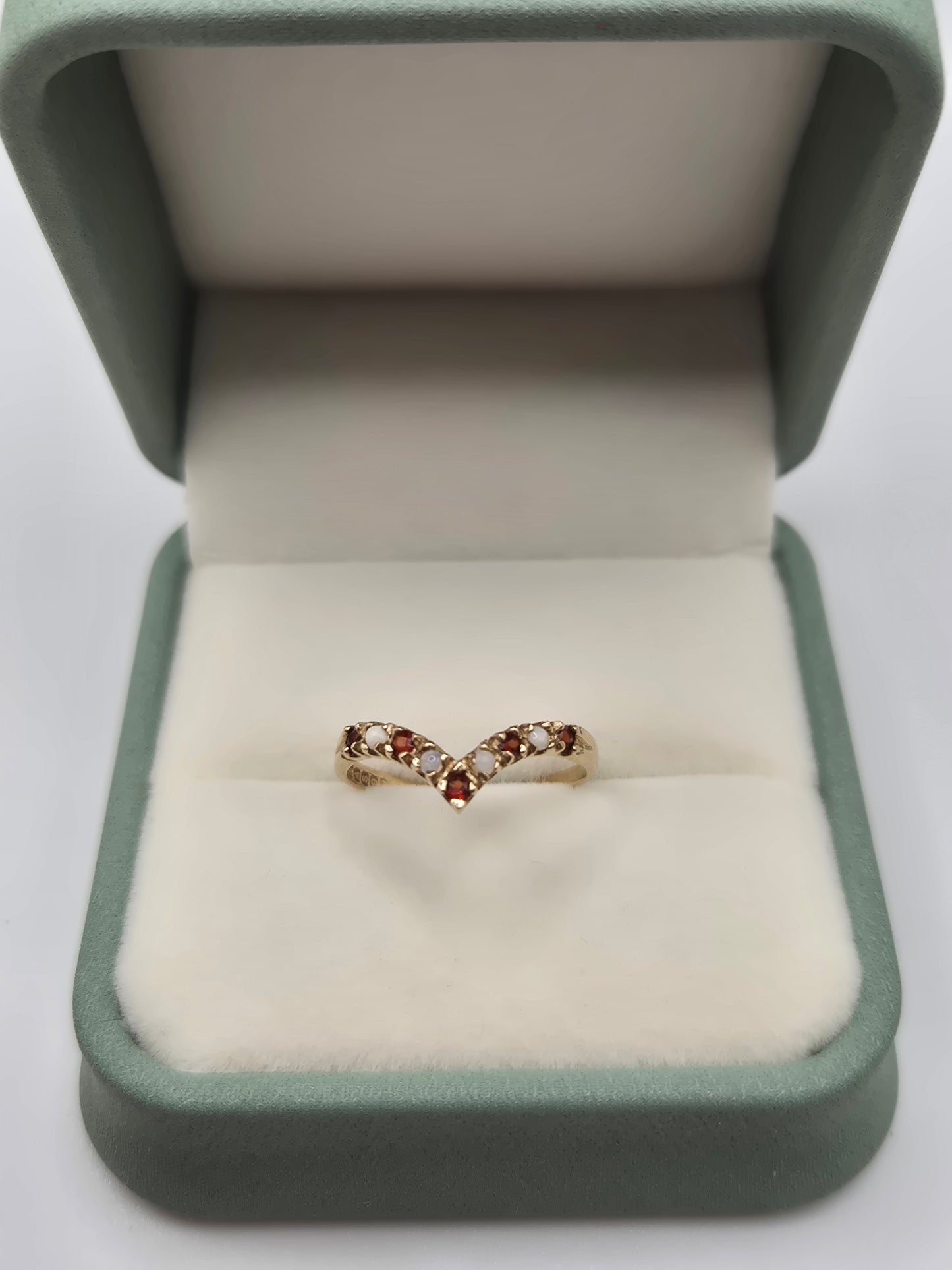 9ct gold garnet and opal wishbone ring