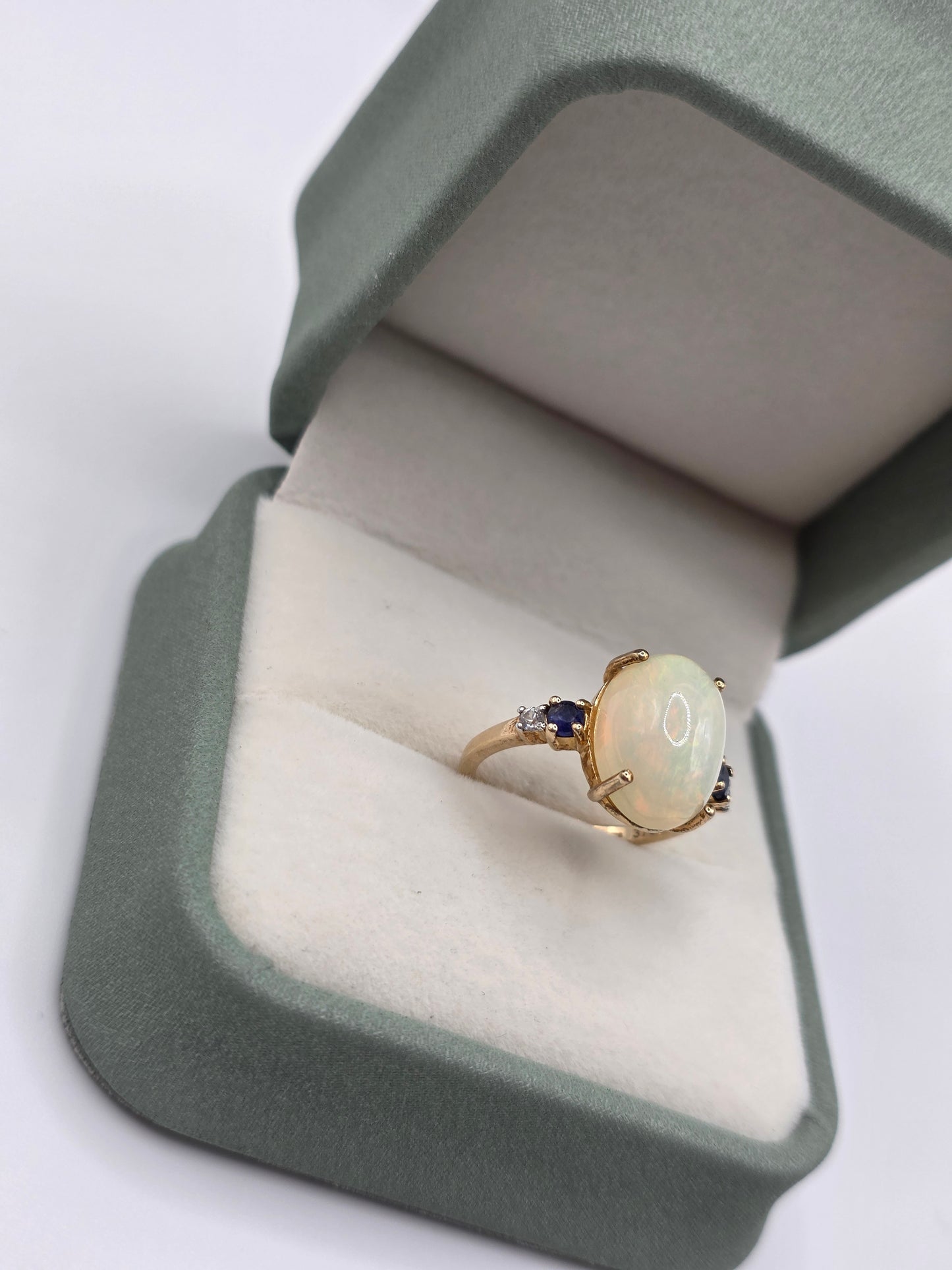 9ct gold opal, sapphire and white spinel ring