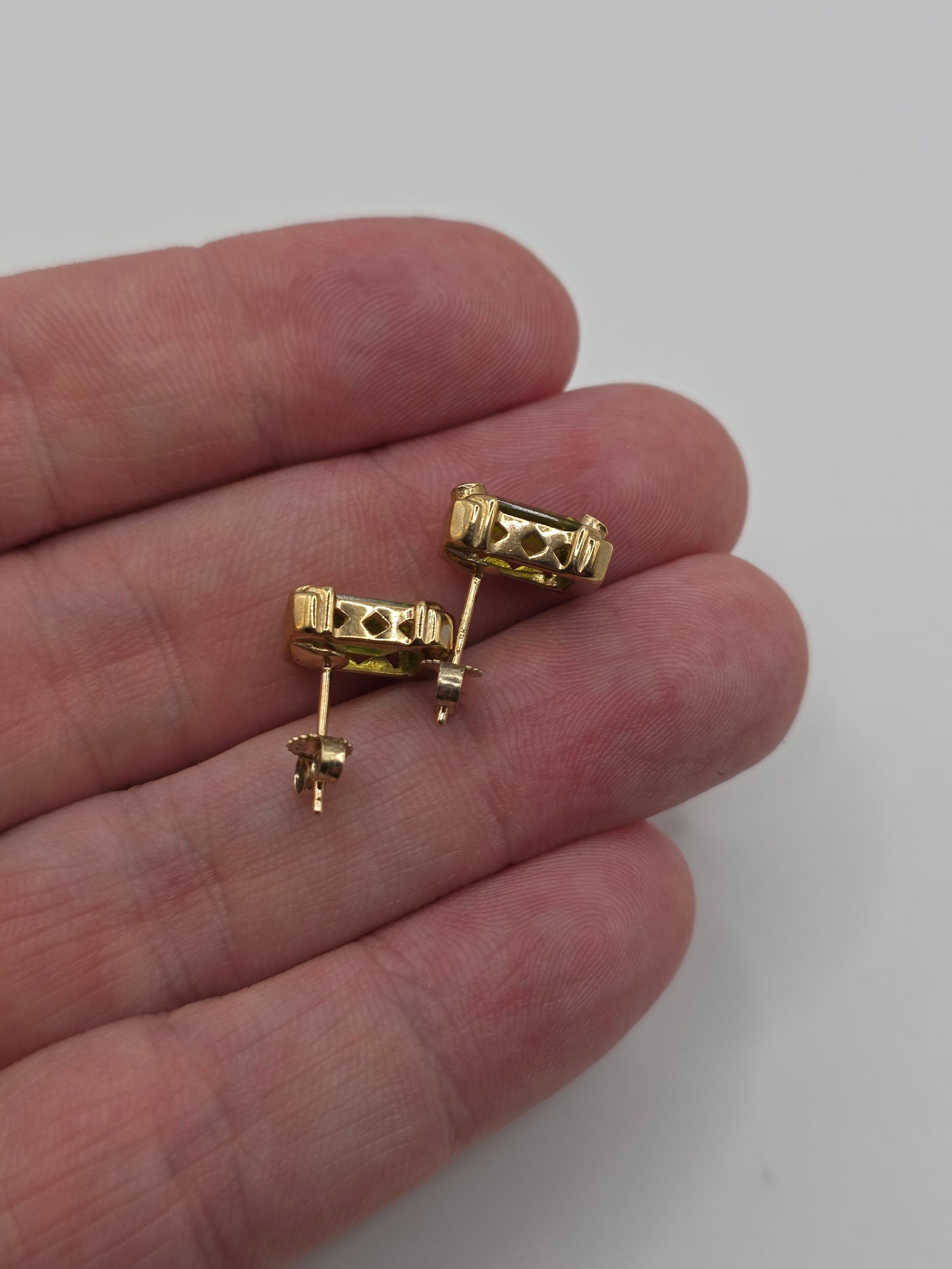 Heavy 9ct gold peridot and diamond earrings