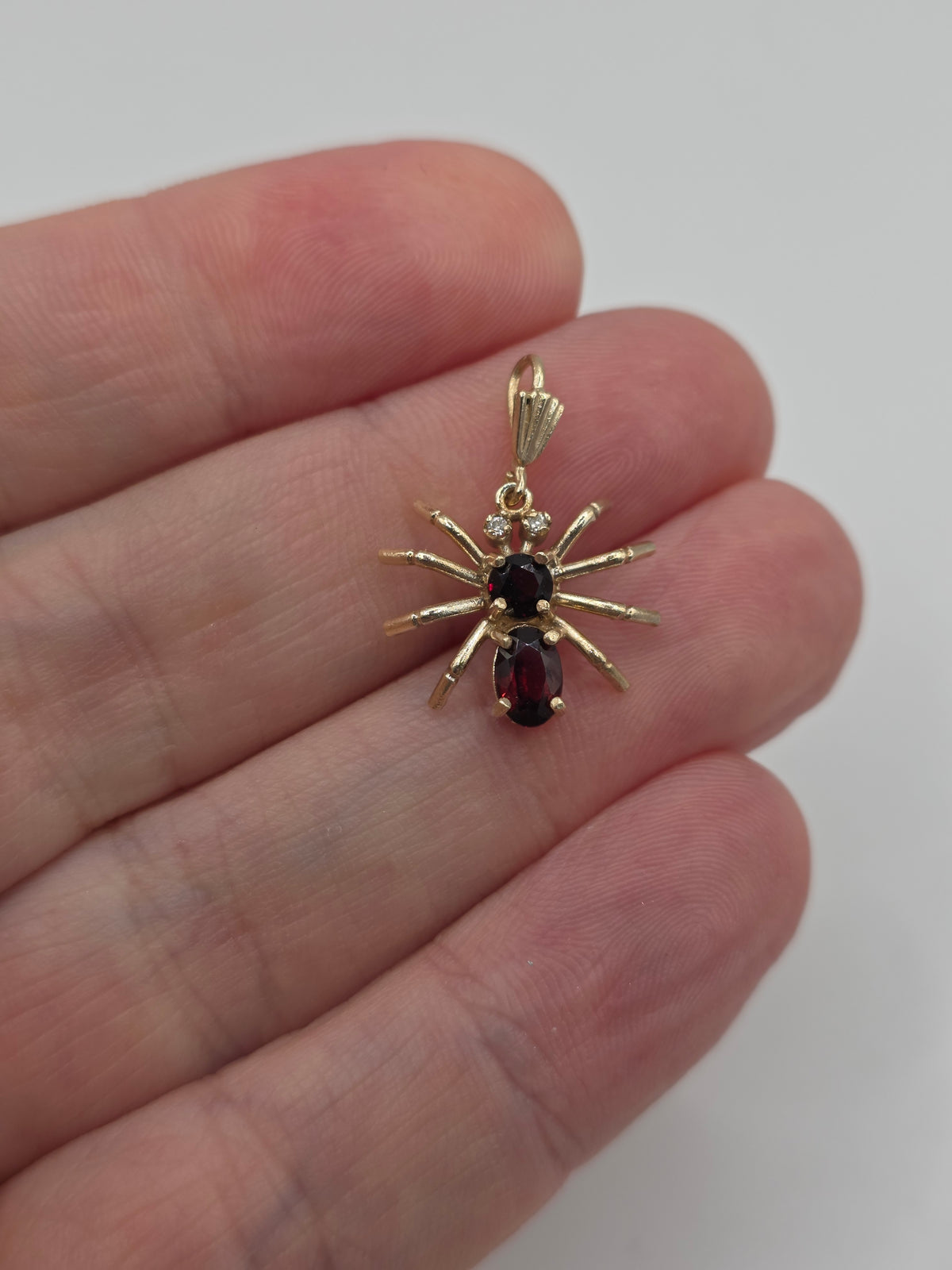 9ct gold garnet and diamond spider pendant