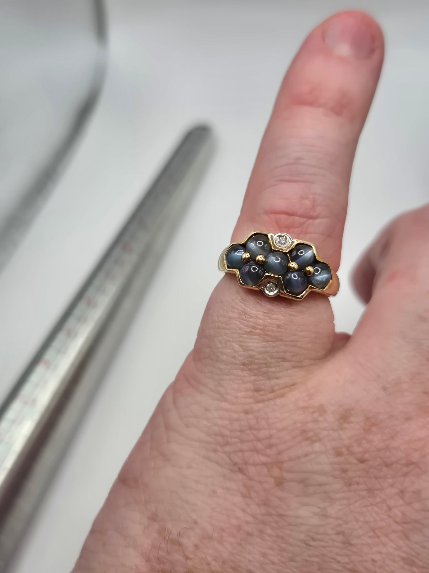 9ct gold cat's eye and diamond ring