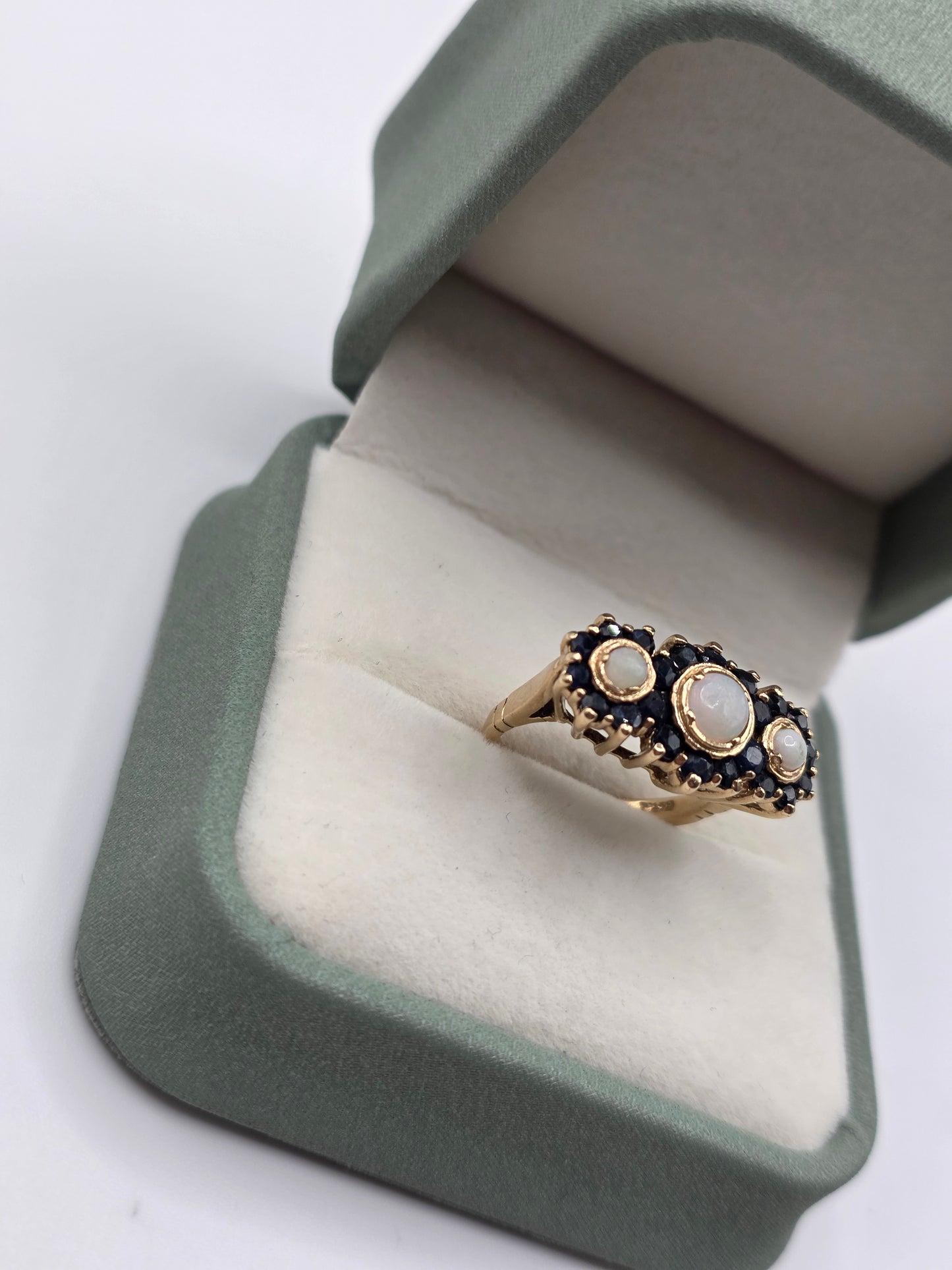 Heavy 9ct gold opal and sapphire ring