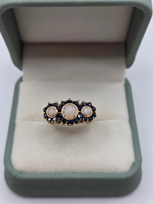 Heavy 9ct gold opal and sapphire ring