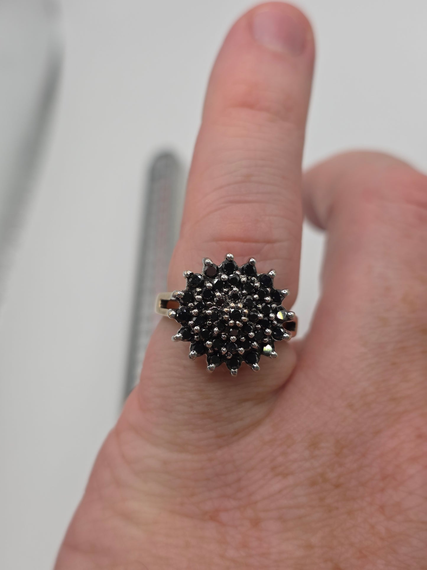 Heavy 9ct gold black diamond cluster ring