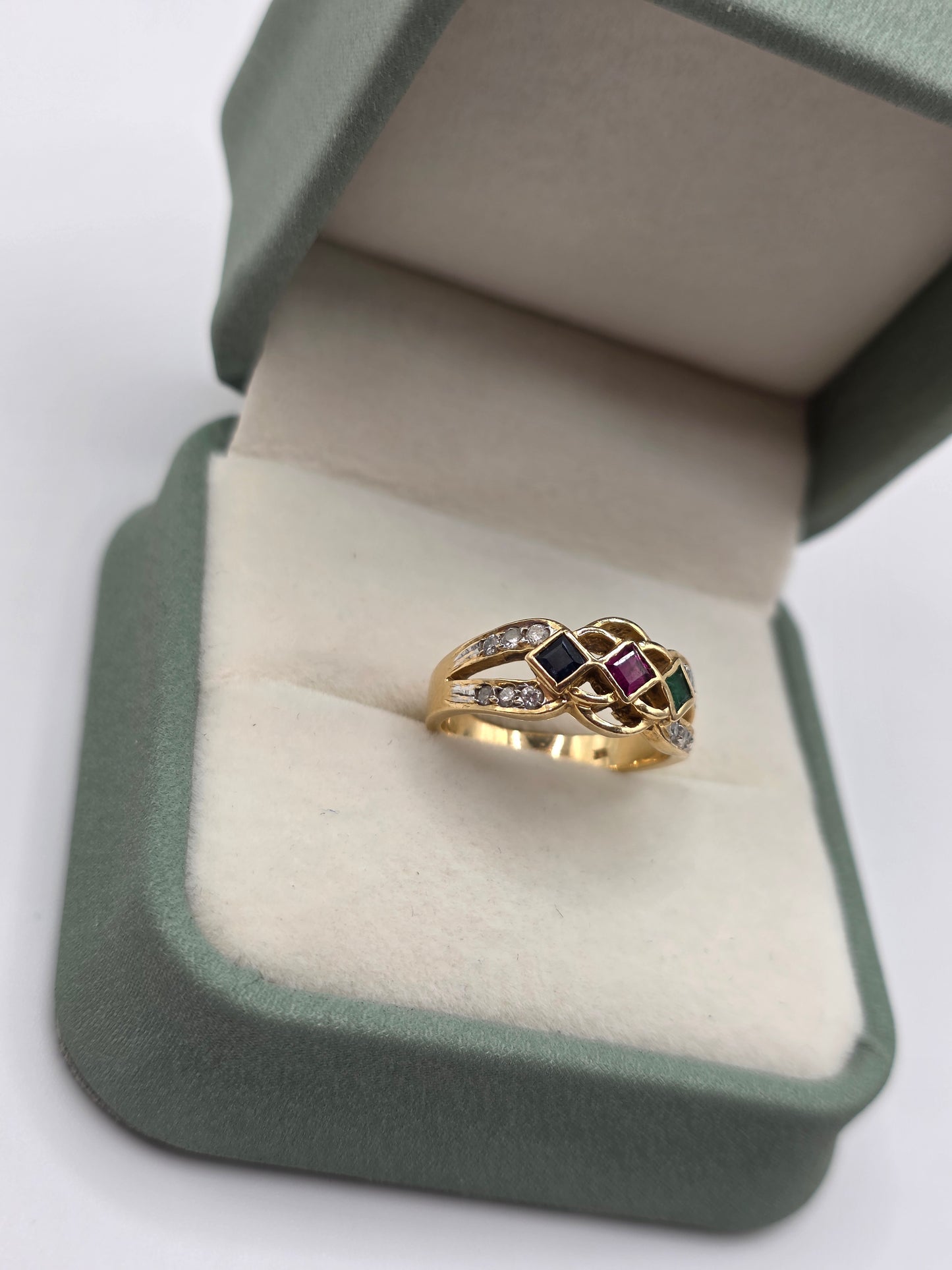 Heavy 14ct gold emerald, sapphire, ruby and diamond ring