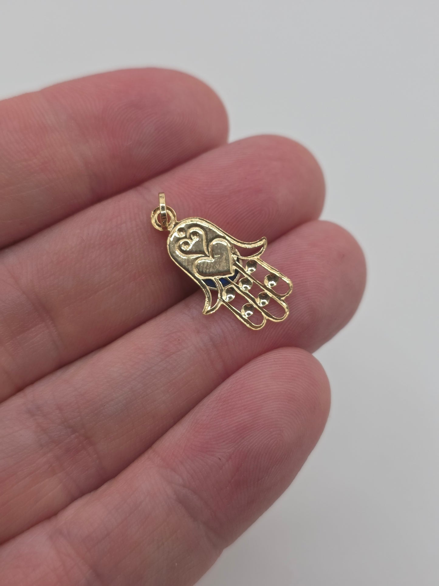 9ct gold hamsa and evil eye charm