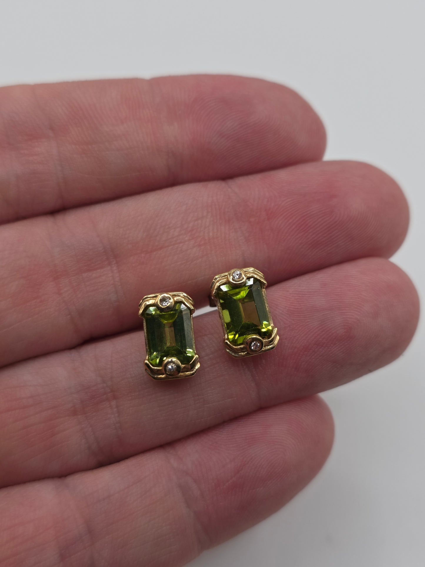 Heavy 9ct gold peridot and diamond earrings