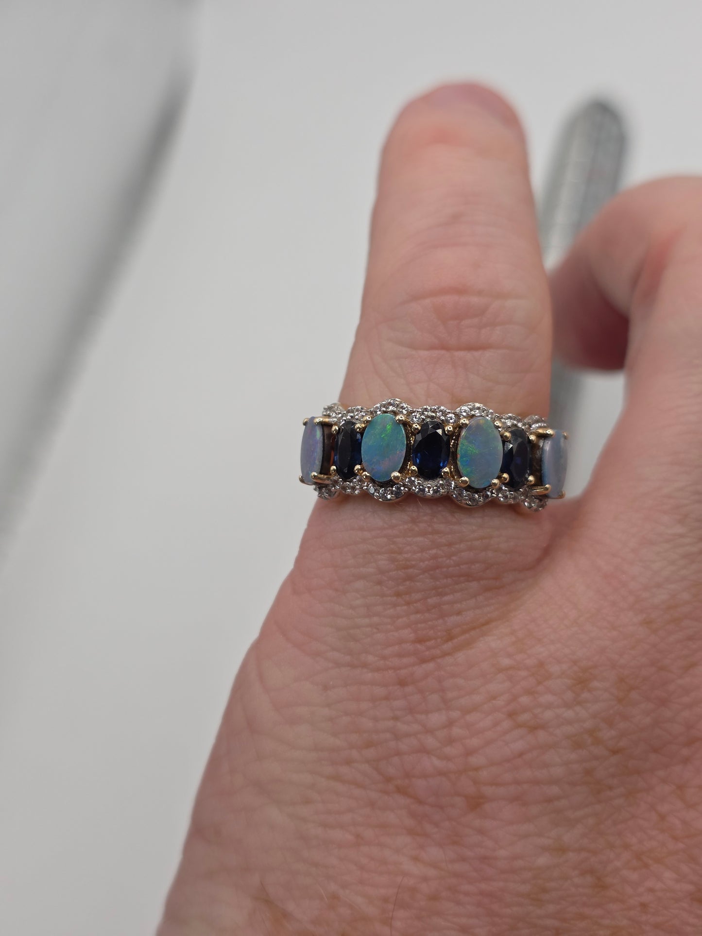 9ct gold opal doublet, sapphire and zircon ring