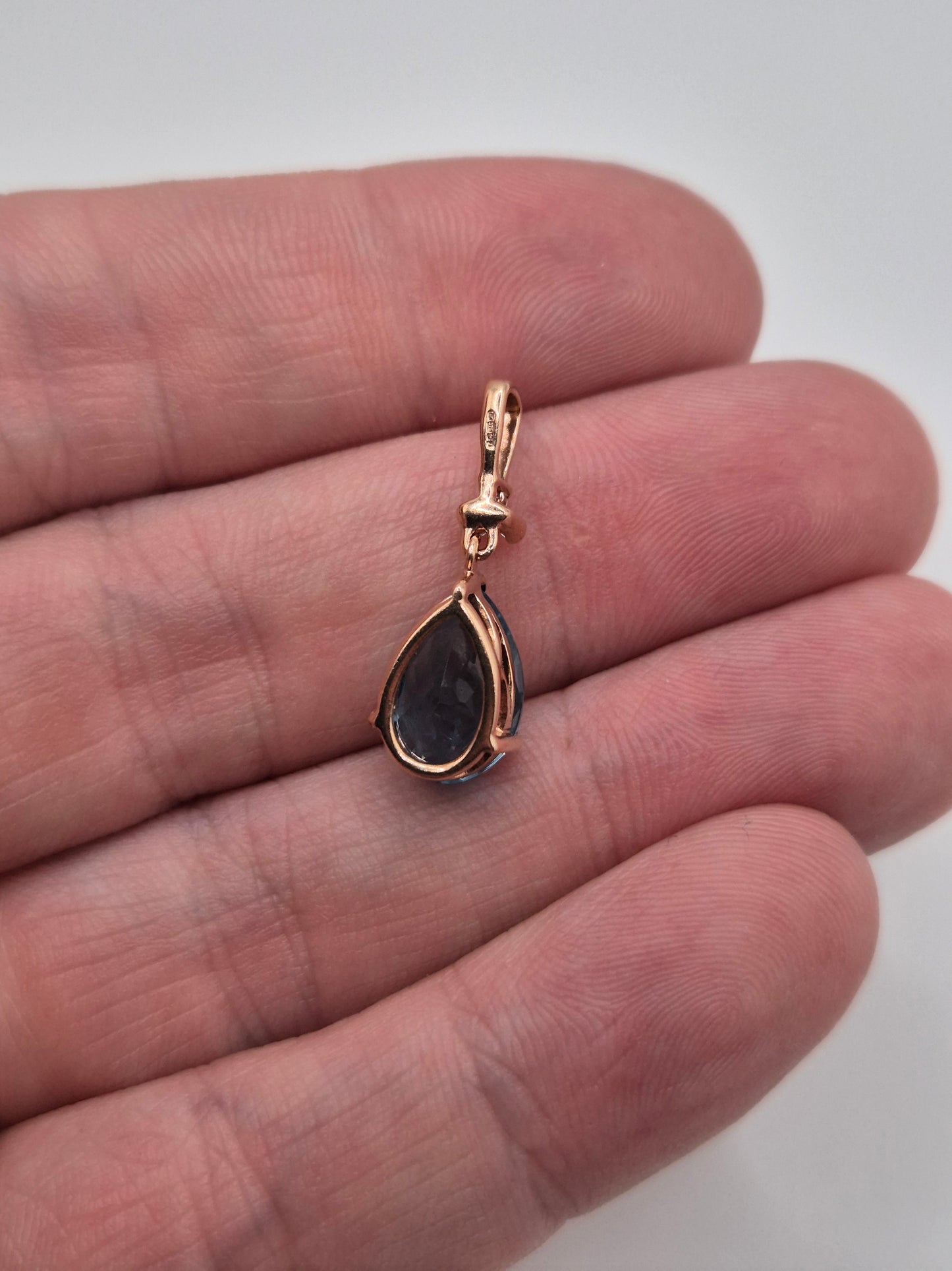 9ct gold topaz and diamond pendant