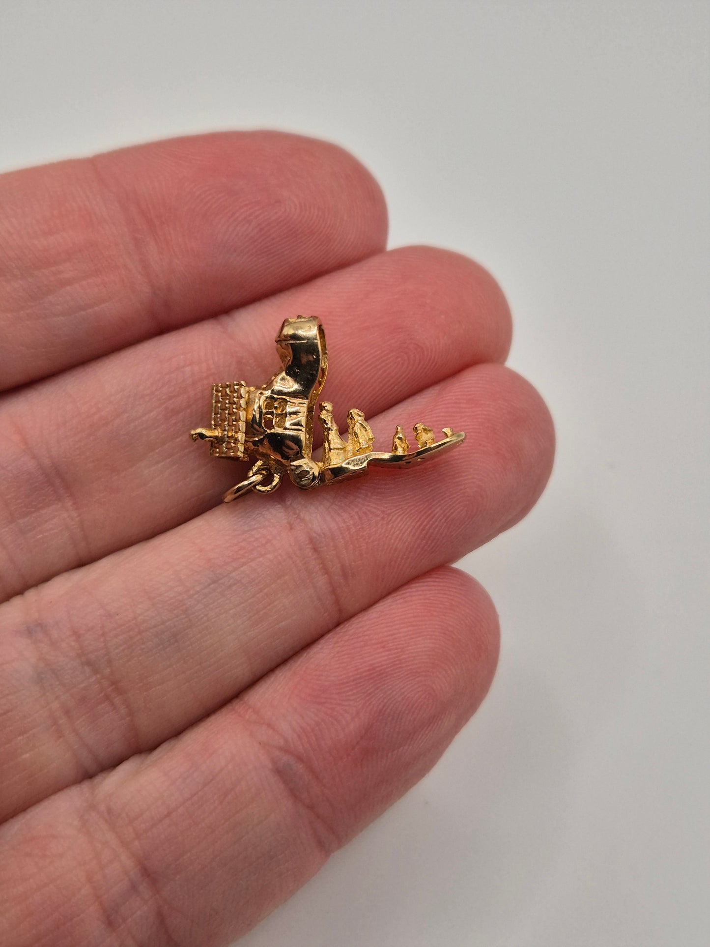Vintage 9ct gold articulated women in shoe house charm