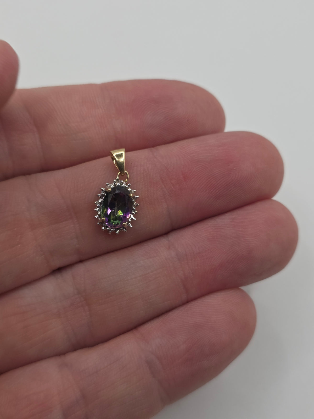9ct gold mystic topaz and diamond pendant