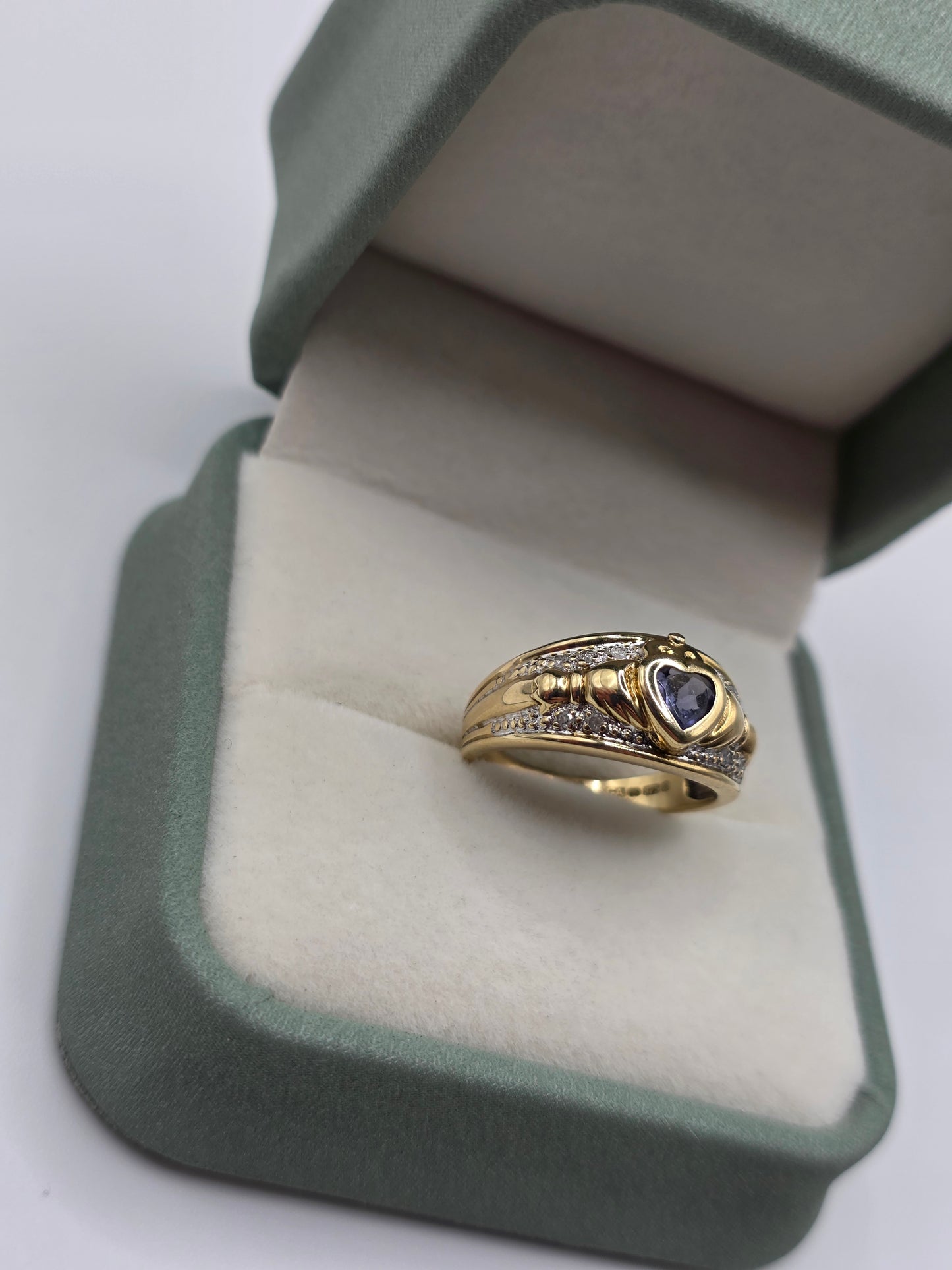 9ct gold tanzanite and diamond claddagh ring