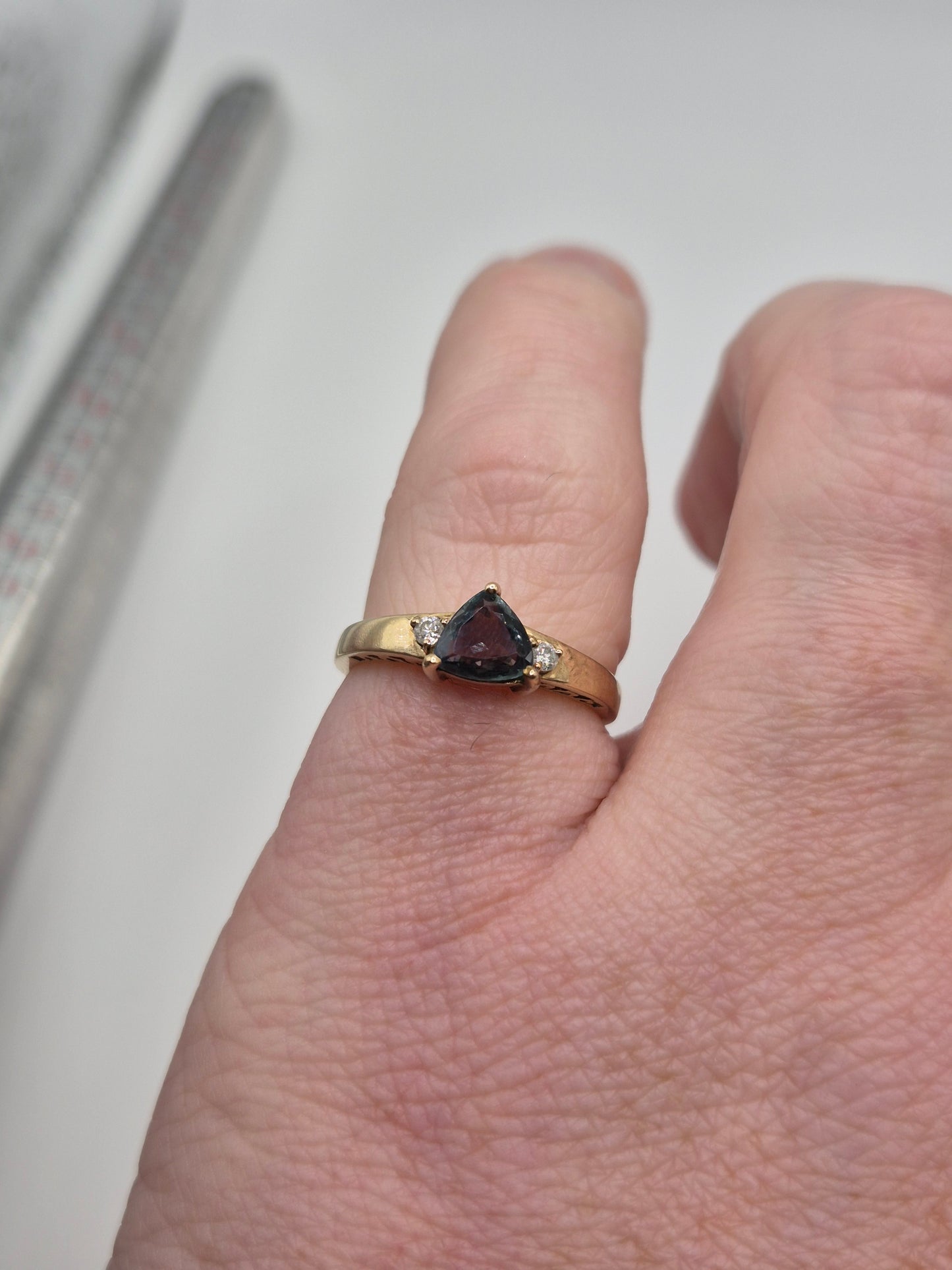 9ct gold colour change sapphire and diamond ring