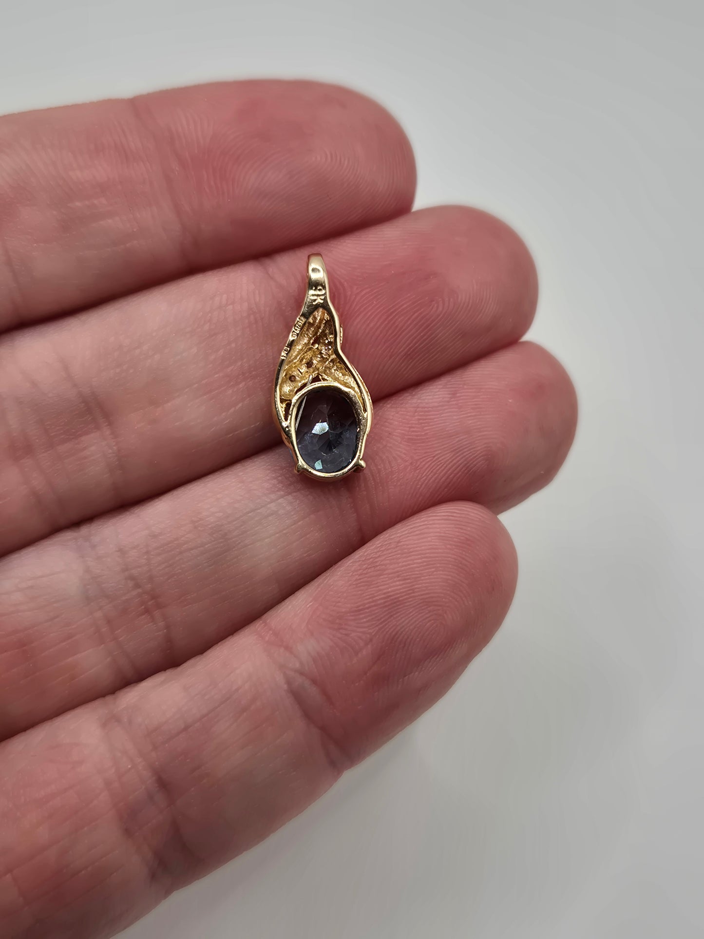 9ct gold topaz and diamond pendant