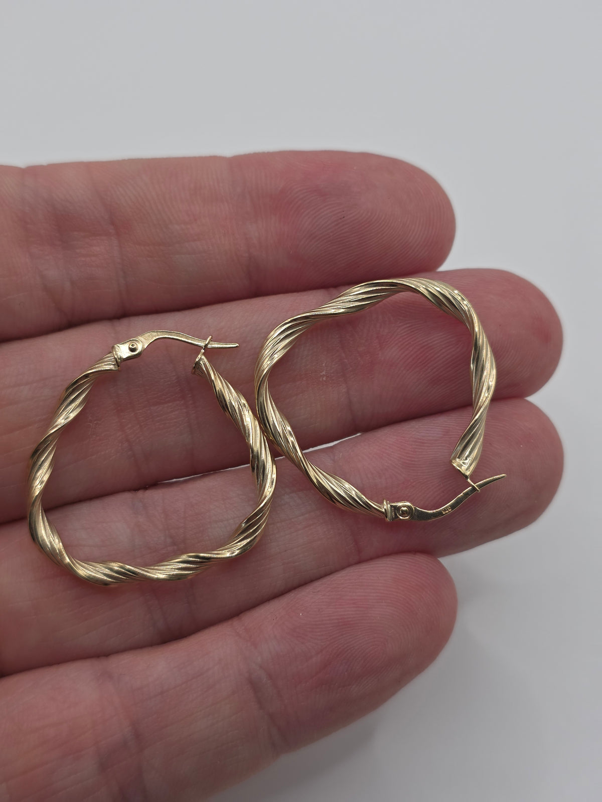 9ct gold twisted creole earrings