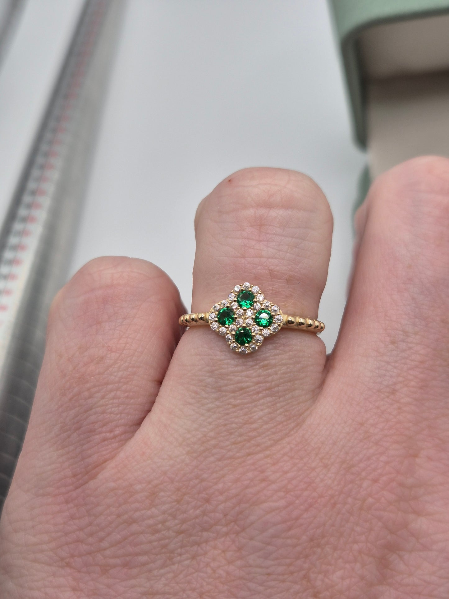 14ct gold simulated emerald and zircon ring