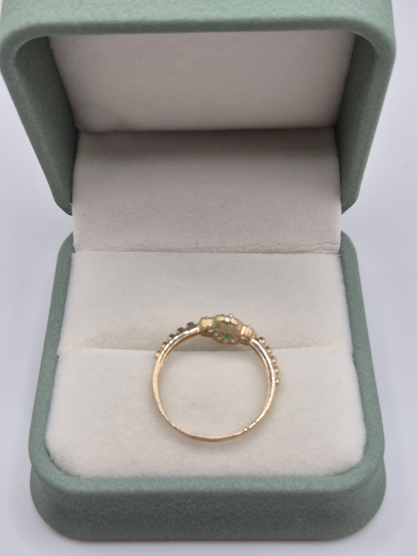 14ct gold simulated emerald and zircon ring