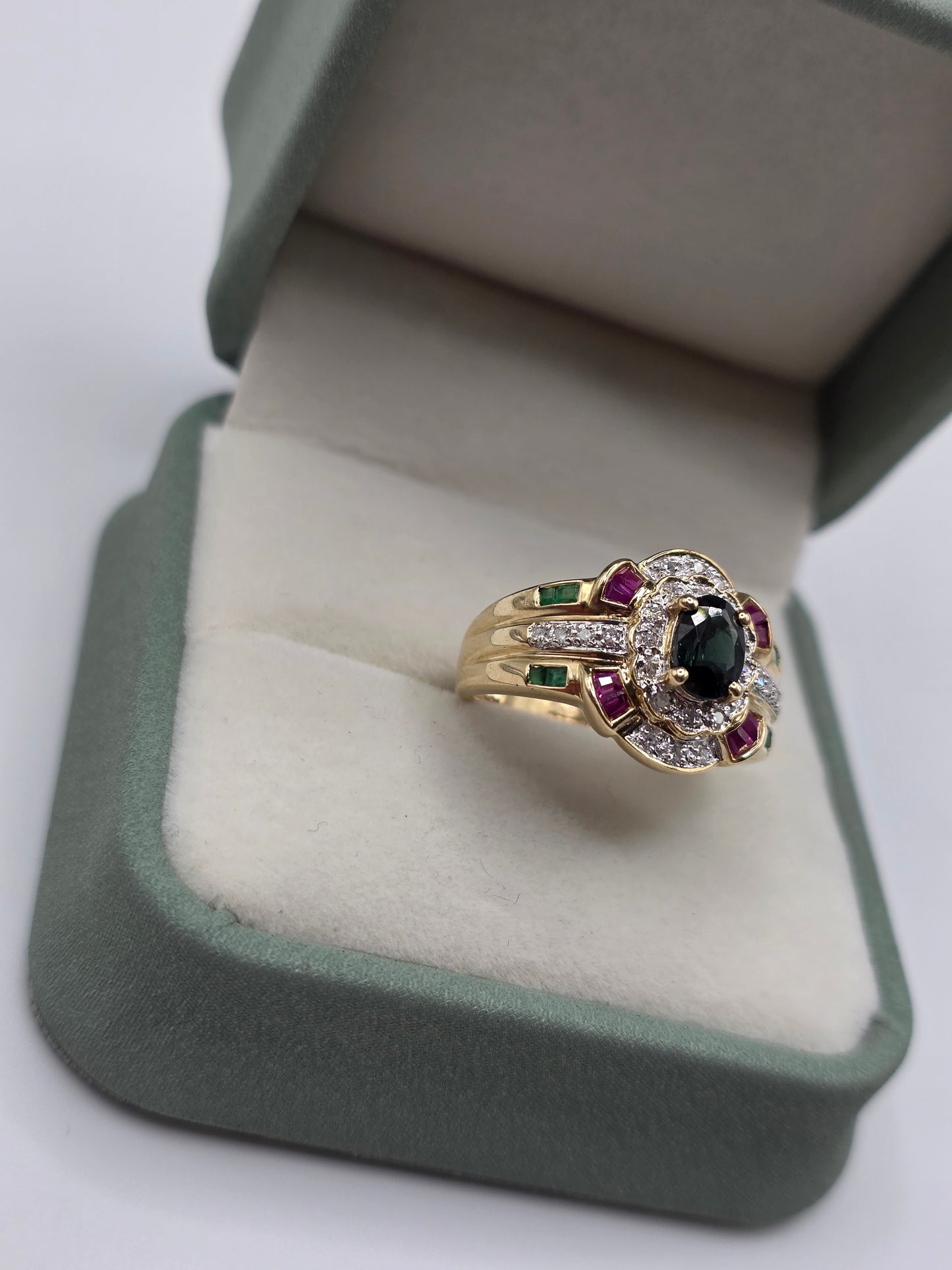 9ct gold sapphire, emerald, ruby and diamond ring