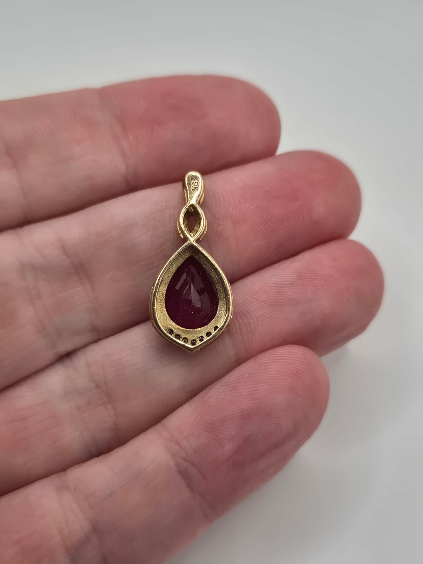 9ct gold ruby and diamond pendant
