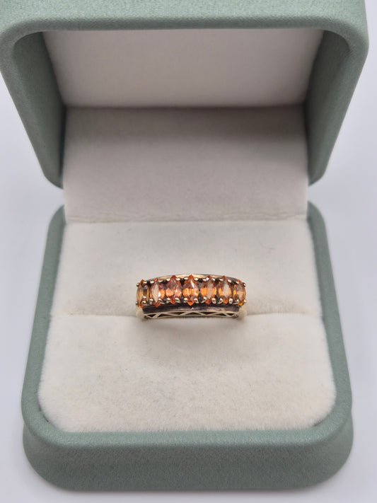Heavy 9ct gold orange sapphire ring