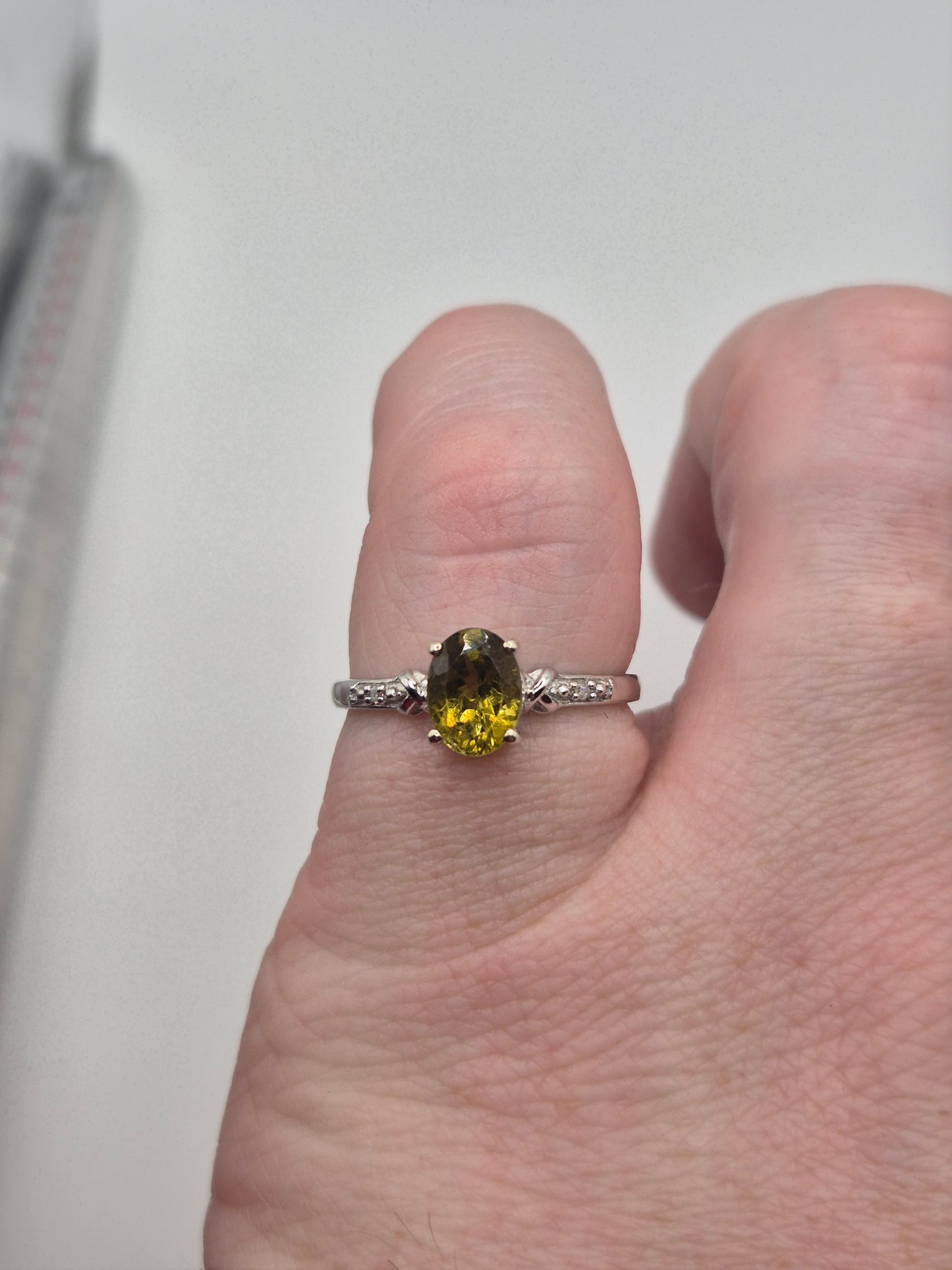 9ct white gold sphene and diamond ring