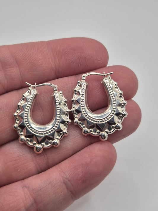 Silver creole spike earrings