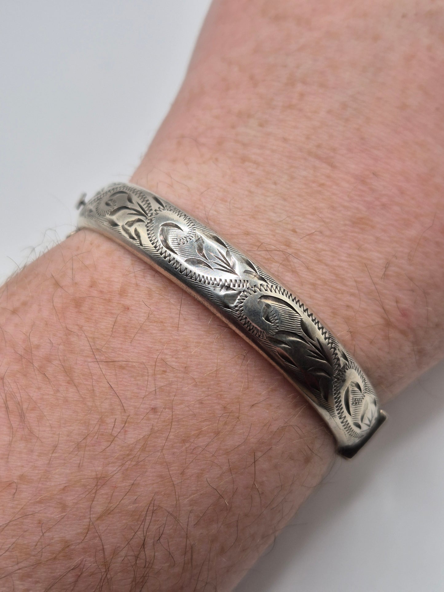 Vintage engraved silver bangle
