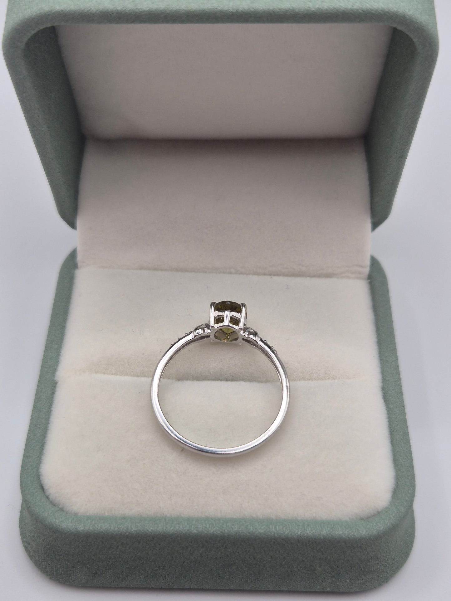9ct white gold sphene and diamond ring