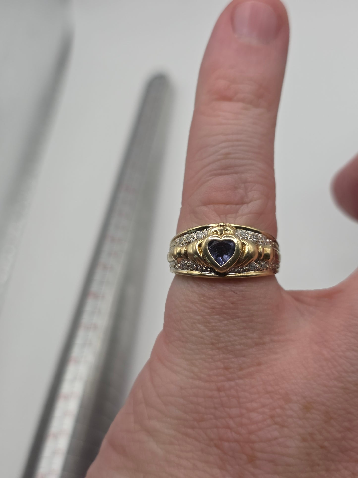 9ct gold tanzanite and diamond claddagh ring