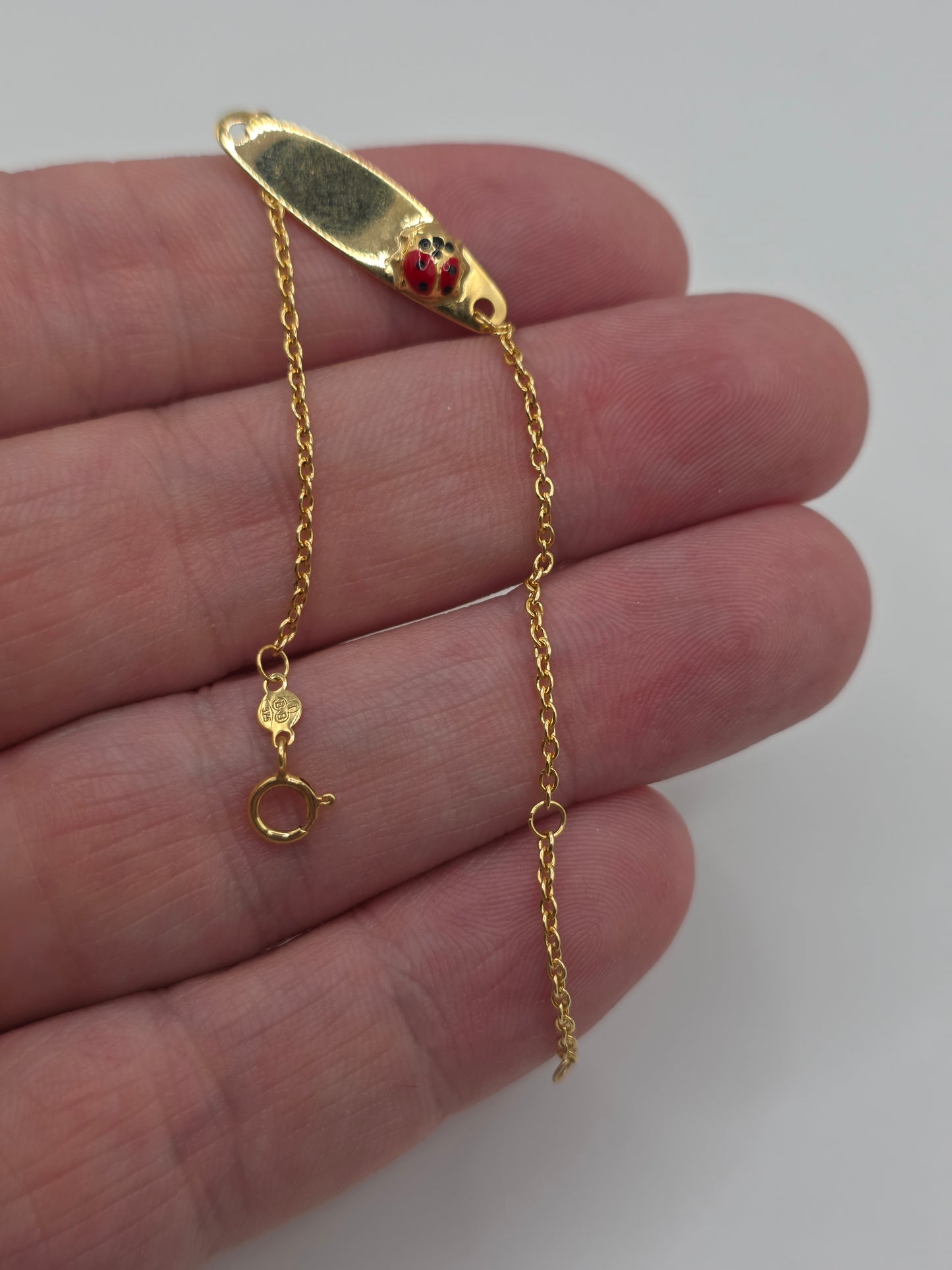 9ct gold lady bird bracelet