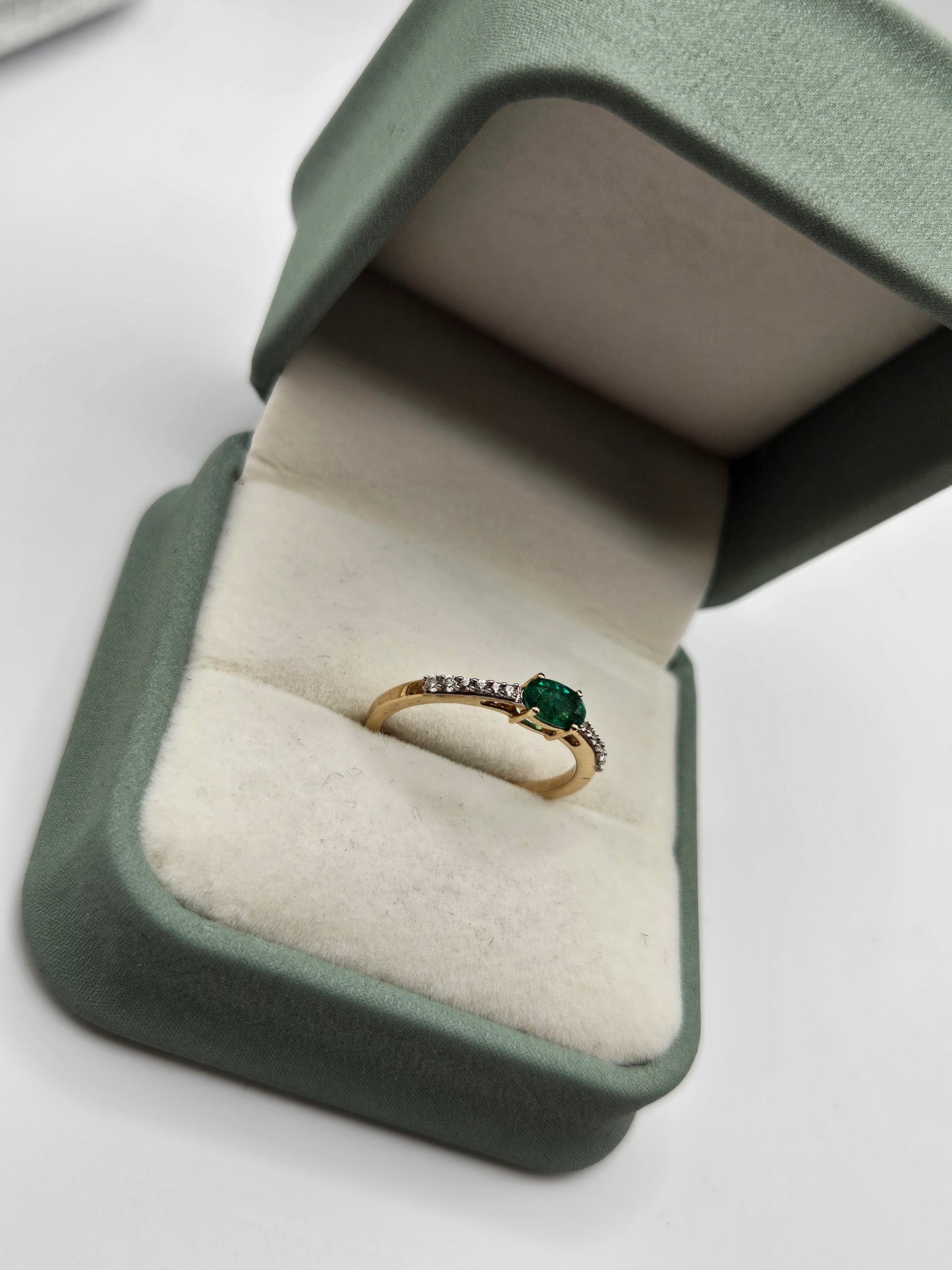 9ct gold emerald and zircon ring