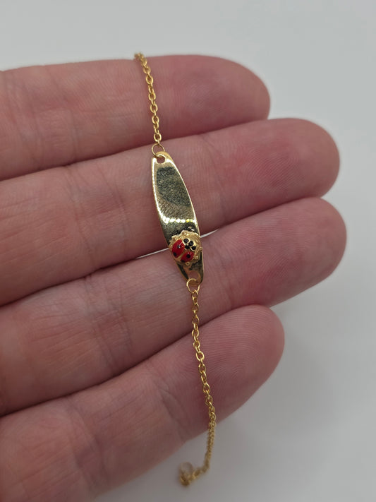 9ct gold lady bird bracelet