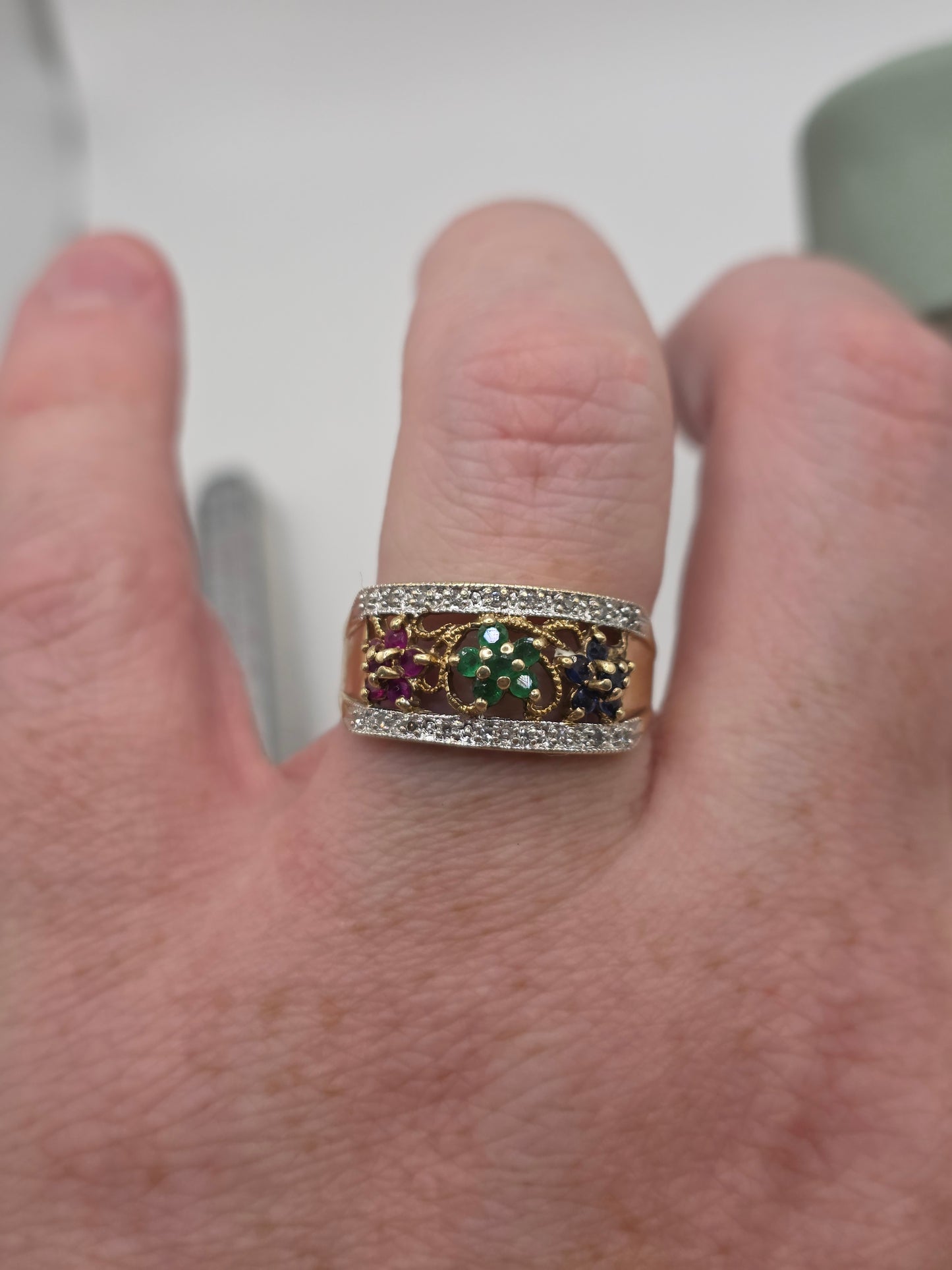 9ct gold emerald,sapphire,ruby and diamond ring