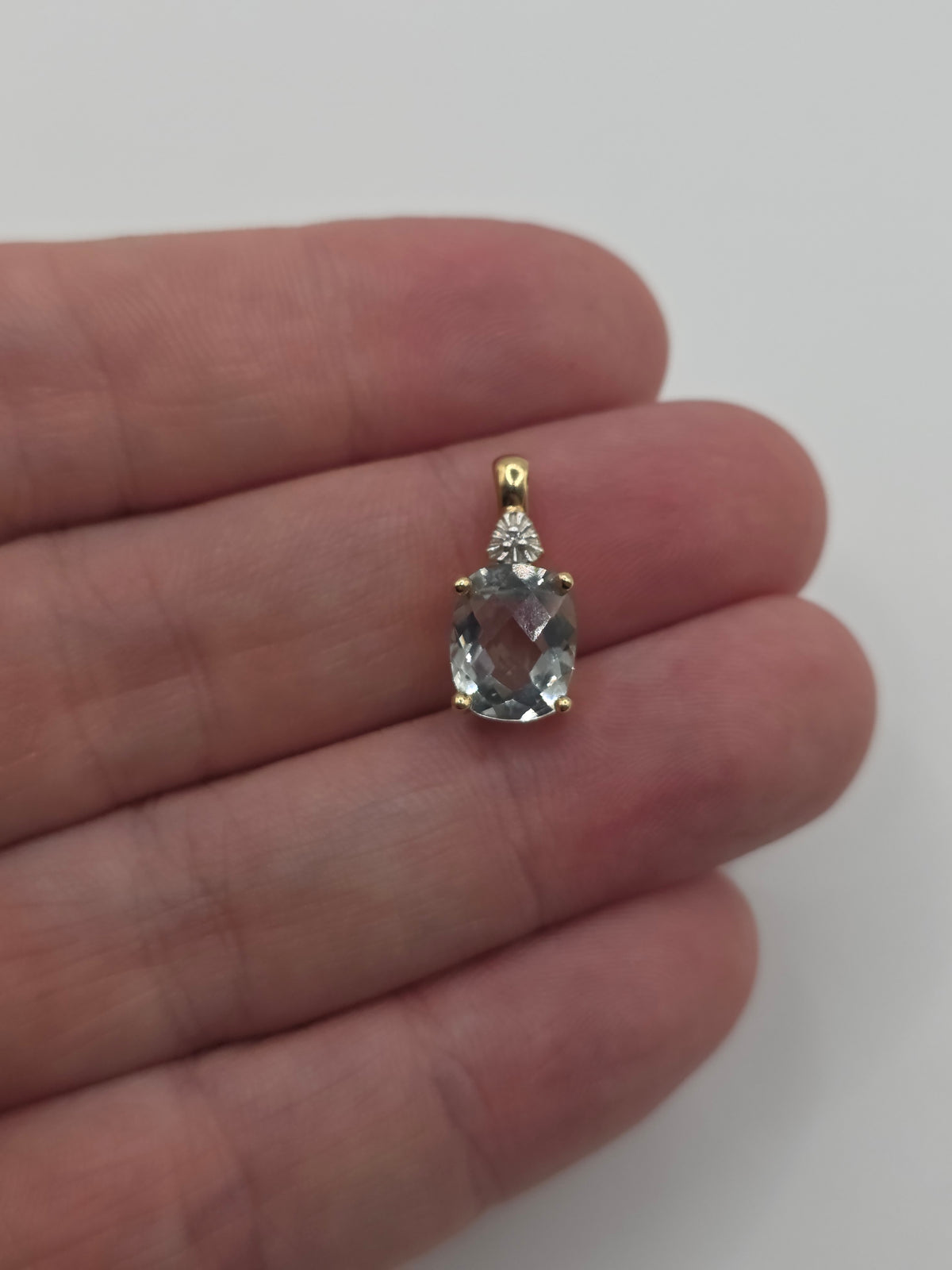 9ct gold aquamarine and diamond pendant