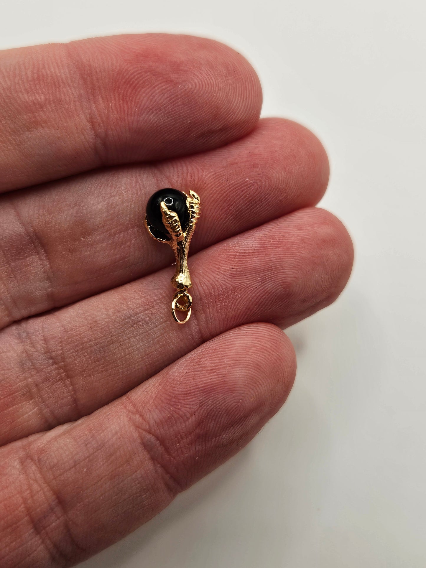 9ct gold onyx claw charm