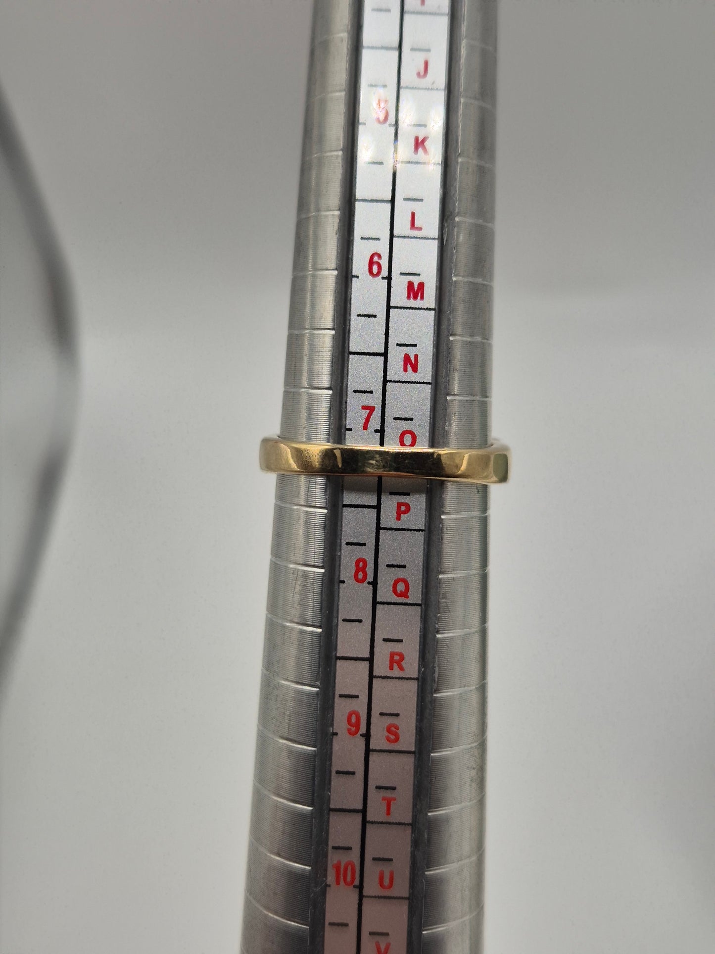 Heavy 9ct gold orange sapphire ring