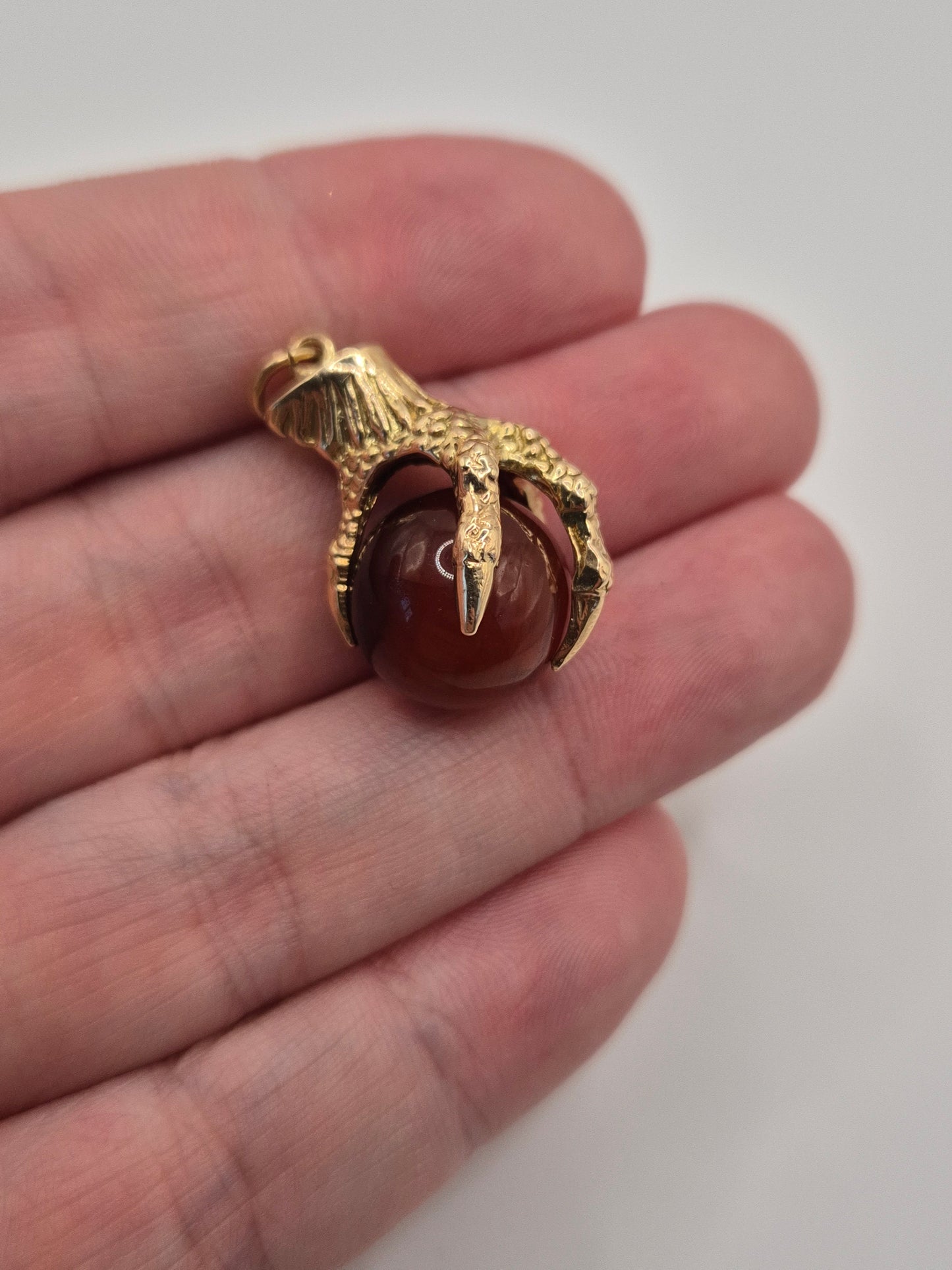 Huge 9ct gold eagle claw carnelian pendant