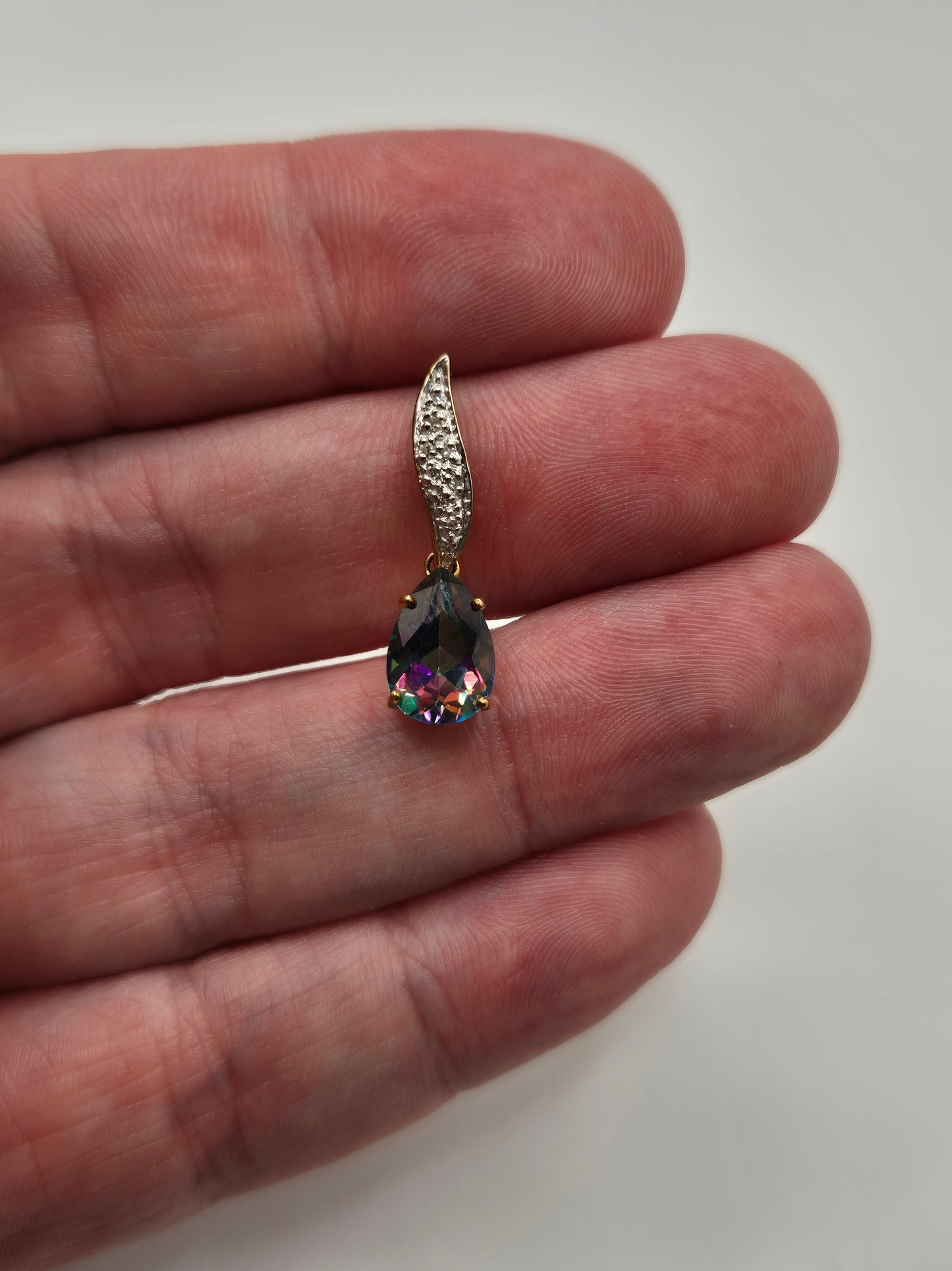 9ct gold mystic topaz and diamond pendant