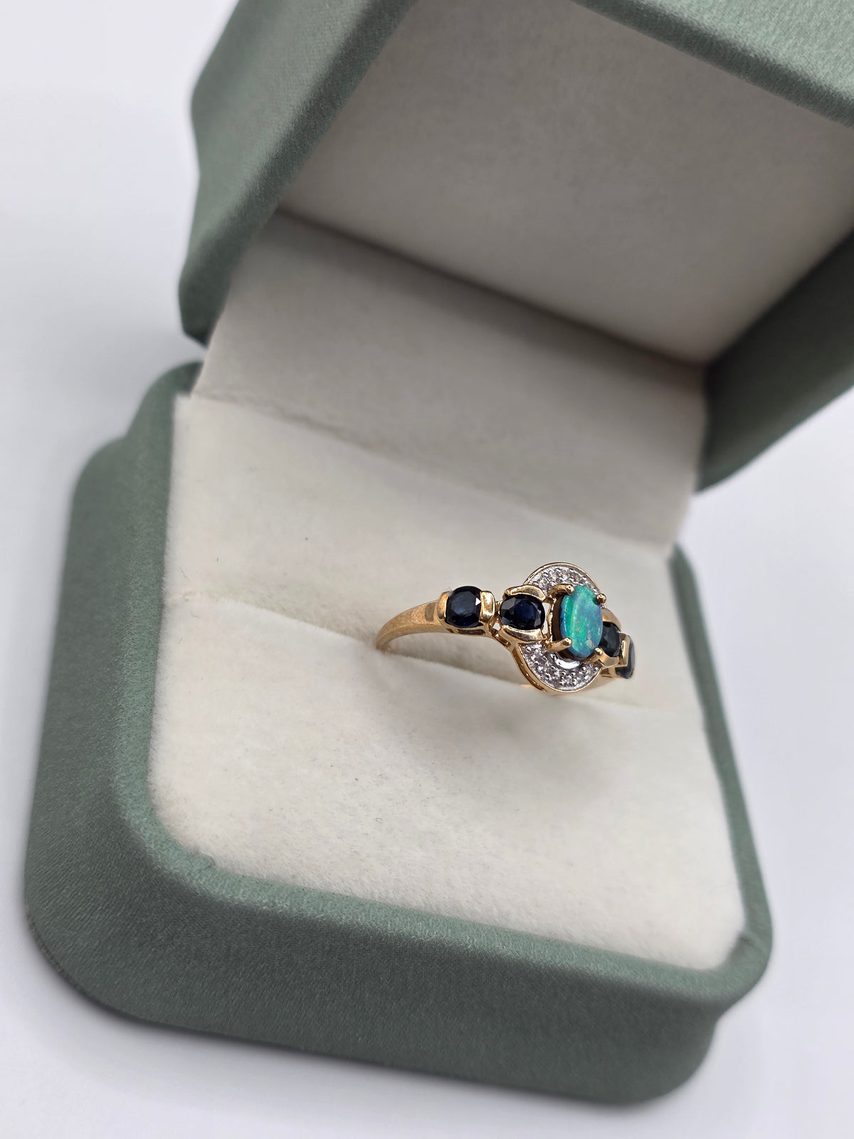 9ct gold opal doublet, sapphire and white zircon ring