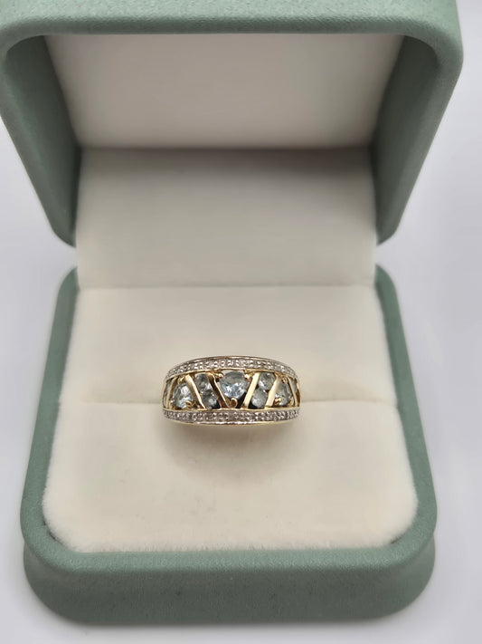 Heavy 9ct gold aquamarine and diamond ring