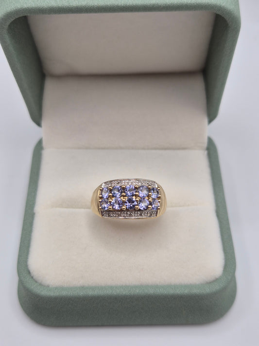 Heavy 9ct gold tanzanite and diamond ring
