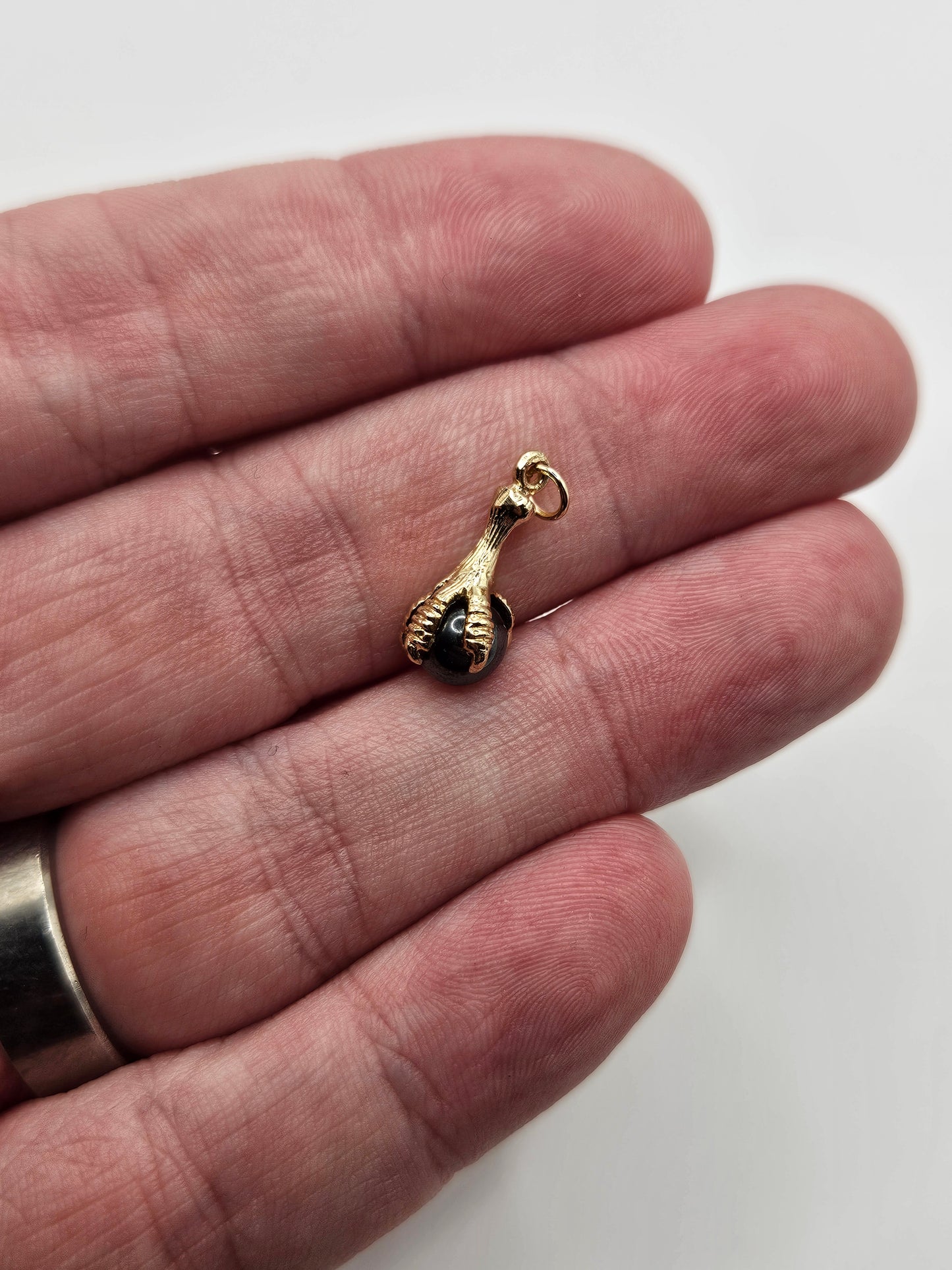 9ct gold hematite claw charm