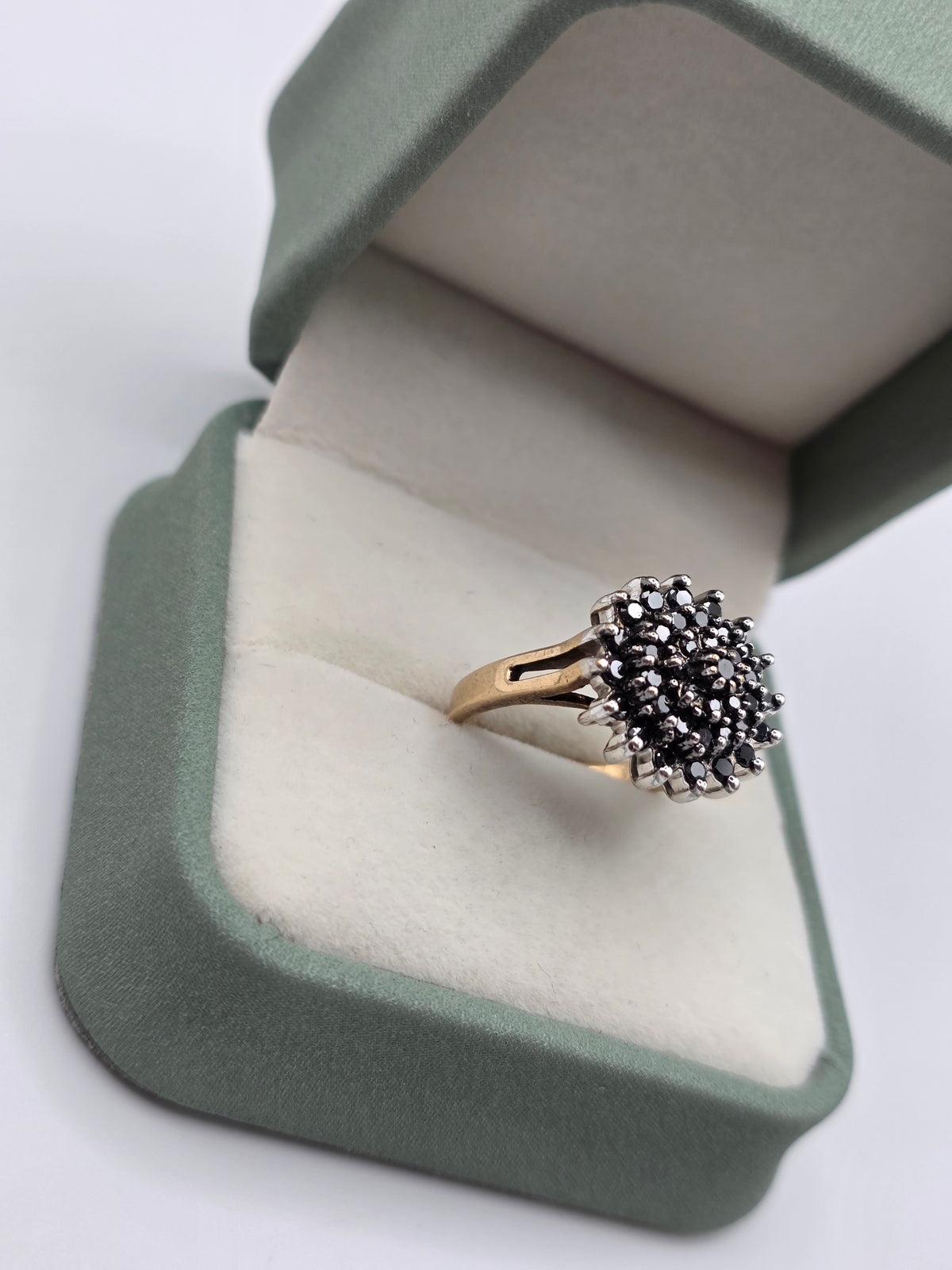Heavy 9ct gold black diamond cluster ring